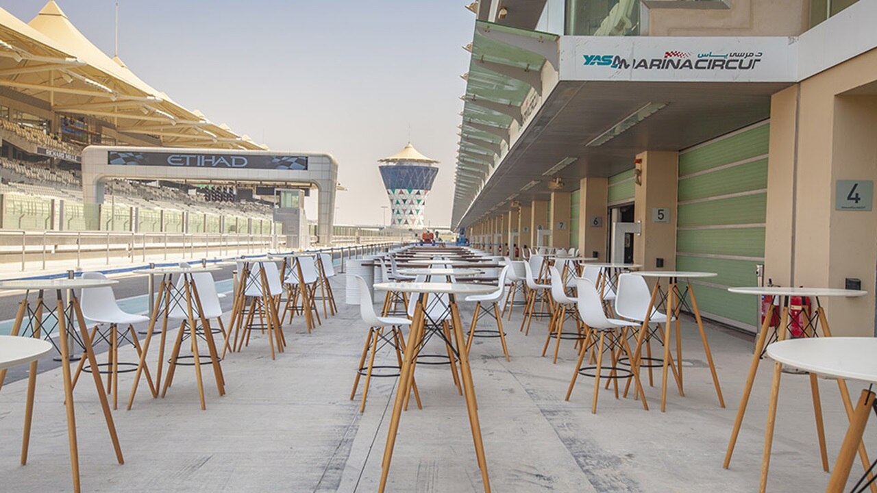 tables set up outside next to F1 track for Track Hire Event